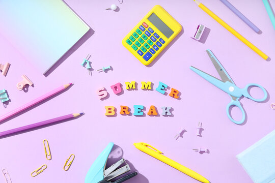 Composition with text SUMMER BREAK made of colorful letters and different school supplies on lilac background