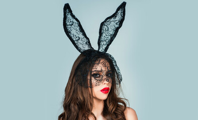 Sexy Easter bunny girl. Woman rabbit mask. Sensual seductive female.
