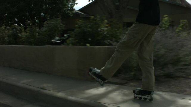 Tall Man Rollerblading down the Street