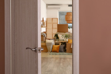 Open door in room on moving day, closeup
