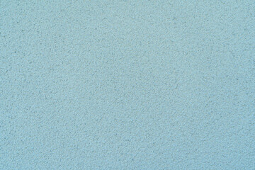 Cement wall blue color is used as background