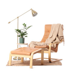 Armchair with ottoman, table and lamp on white background