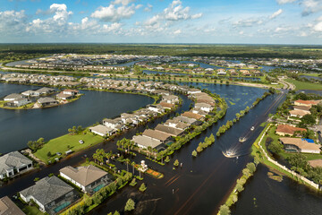 Obraz premium Hurricane Debby flooded cars and homes in Sarasota, Florida. Aftermath of natural disaster