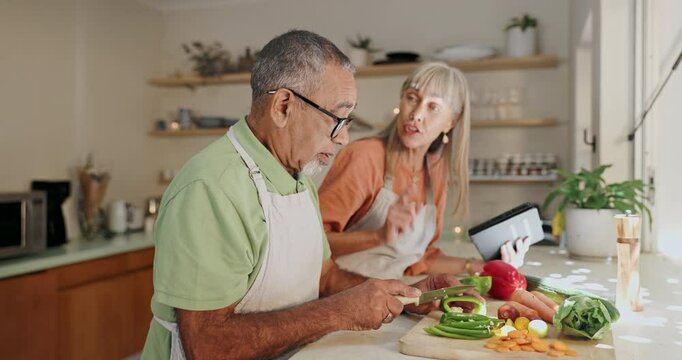 Cooking, help and mature couple in kitchen with healthy food for salad, nutrition and cutting ingredients for lunch. Diet, vegetables and man with happy woman, knife and recipe and dinner at home