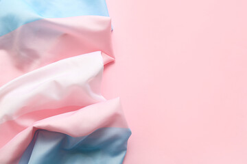 Transgender flag on pink background with space for text