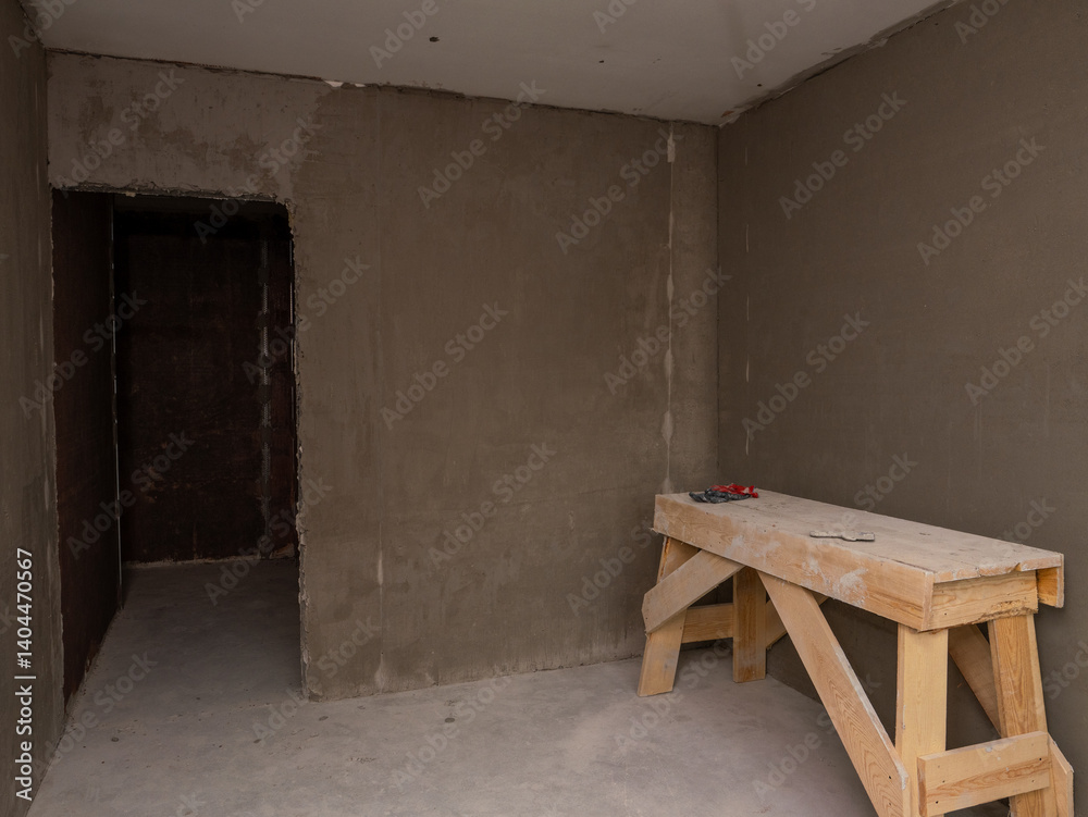 Poster A room with a wooden table and a pair of scissors on it