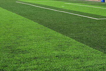 Obraz premium artificial green grass background for playground