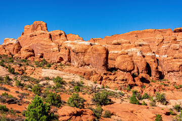 Rugged red canyon walls of the Fiery Furnace area in Arches National Park near Moab Utah