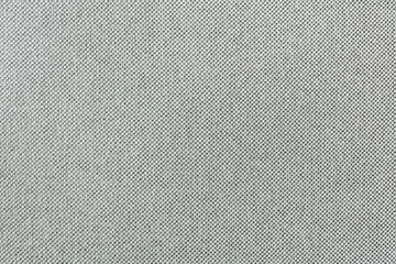 light gray synthetical fabric. background of woven textile. high-detailed texture.