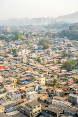 Fototapeta premium India, Maharashtra, Mumbai, a view of a city skyline dharavi slum and tall buildings