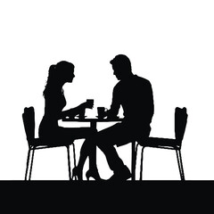 silhouette of a couple in a restaurant