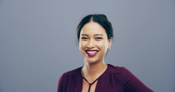 Woman, flirting and blow a kiss in studio, gray background or mockup for dating, emoji and love. Hand, gesture and portrait of lady with care, support and show affection with confidence and happiness
