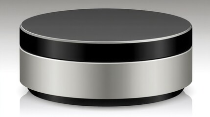 Black and silver container illuminating from below in a dark environment creating an atmospheric glow effect