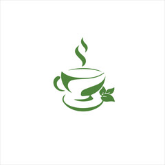 Elegant porcelain teacup with floral design sits gracefully on wooden table