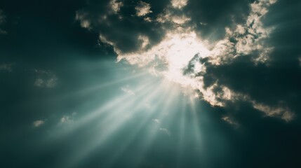 Obraz premium In the sky, light shines from behind dark clouds and sunlight shines into an open area, symbolizing hope and new beginnings, focusing on the details and lighting effects of nature.