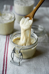 Sourdough starter in a jar, baking sourdough bread
