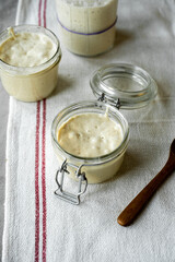 Sourdough starter in jars, baking sourdough bread