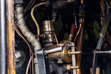 Iconic Jacobite steam train crosses Glenfinnan Viaduct and stops at the station, with historical details, smoke, and nostalgia. Timeless and magical icon in the Scottish Highlands. Locomotive interior