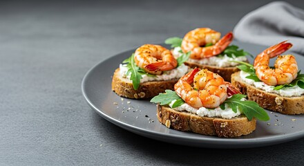 Gourmet shrimp bruschetta with arugula and cream cheese on rustic bread