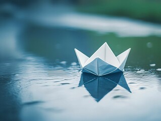 Paper Boat in Puddle