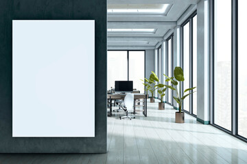 Modern corporate office interior with vertical mockup canvas on green wall and open workspace with large windows and plants in background.. 3D Rendering