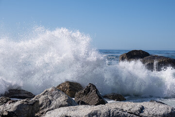 waves crashing on rocks