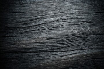 Capturing the rugged elegance of aged timber. A dark, close-up photograph reveals intricate wood grain patterns, showcasing the natural beauty and character of the material. 