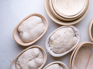 Sourdough Bread in Proofing basket, bannetons baskets for retarding raw dough before baking.
