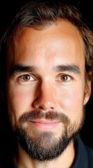 Obraz premium Elegant Close-Up Portrait of a Man with Realistic Features and Captivating Expression