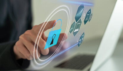 Businessman use a laptop to login by password with virtual screen of padlock, security of private....