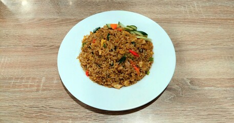 Homemade fried rice served on a white plate