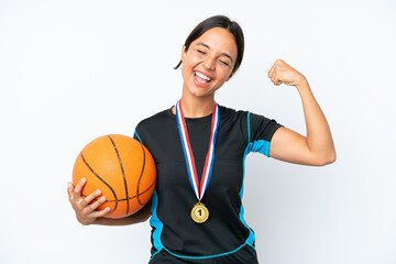 Young basketball player woman isolated on white background doing strong gesture