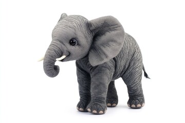 Obraz premium Standing Baby Elephant Plush Toy with Big Ears on White