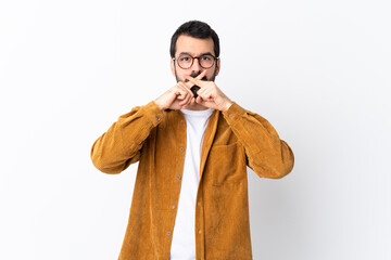 Caucasian handsome man with beard wearing a corduroy jacket over isolated white background showing...