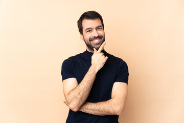 Caucasian handsome man over isolated background smiling