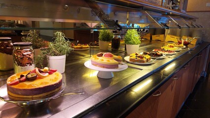 Colorful Dessert Buffet with Cakes and Pastries