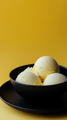 Three scoops of creamy vanilla ice cream in a dark bowl.