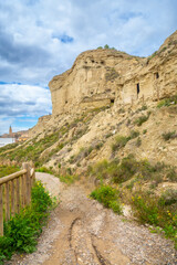 Fototapeta premium Exploring the ancient arguedas caves in navarre, spain
