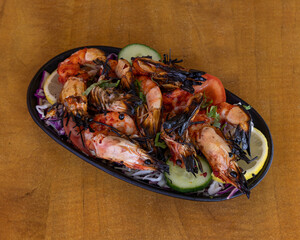 Grilled shrimp with cabbage salad and lemon for seafood and barbecue food visuals