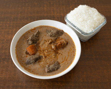 West African beef maf&eacute; with peanut sauce and white rice for traditional African cuisine visuals
