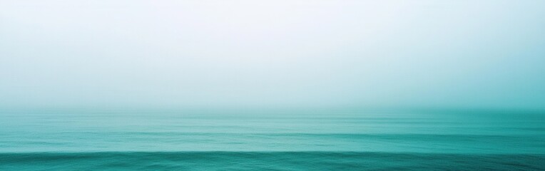 Fototapeta premium Tranquil Teal Gradient: Abstract Ocean View with Soft Horizon in Monochromatic Style