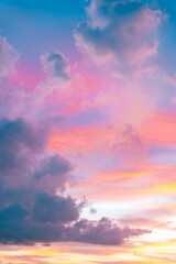 Tranquil sunrise paints the sky with orange, pink, and fading blue for a serene start to the day.