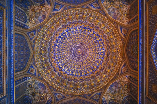 Registan, an old public square in the heart of the ancient city of Samarkand, Uzbekistan. Translation: In the name of Allah Almighty who creates