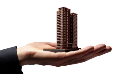 A person holding a miniature model of modern skyscrapers in their hand, showcasing urban development and architecture