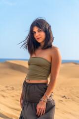 Young woman exploring the maspalomas dunes in gran canaria