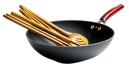 Wok and Culinary Essentials: A striking studio shot showcases a sleek, black wok, nested alongside a collection of bamboo culinary tools, symbolizing the heart of culinary craft.