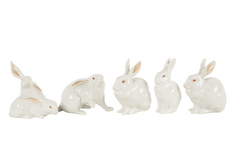 white rabbit and easter eggs  A group of white ceramic rabbits