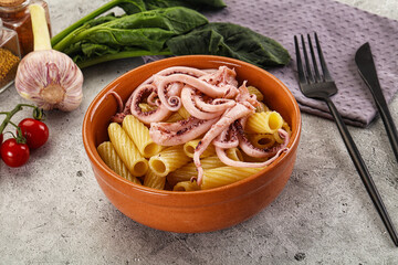 Italian cuisine - pasta tortiglioni with squid