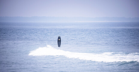 surfboard in the sea as a backdrop for a seaside holiday