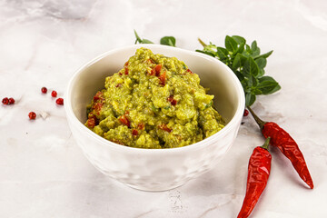 Guacamole with avocado, tomato and chili